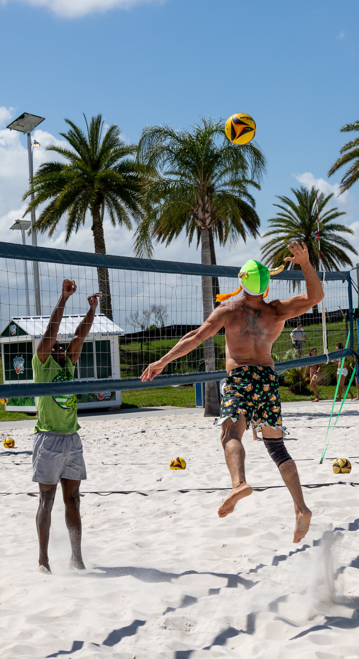 Beach volleyball action shot